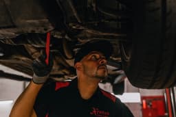 Team member working on car